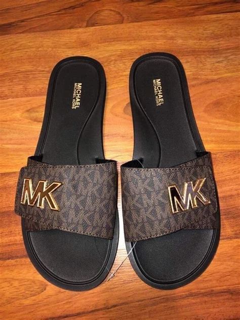 Klapki Michael Kors damskie .